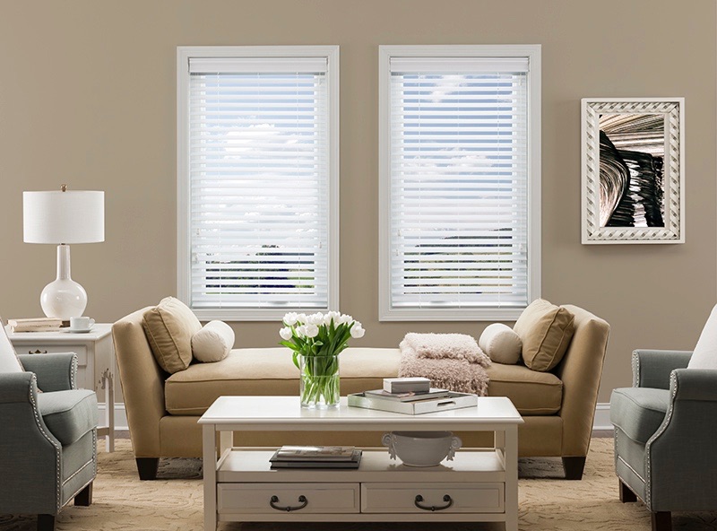 sofa under windows with blinds